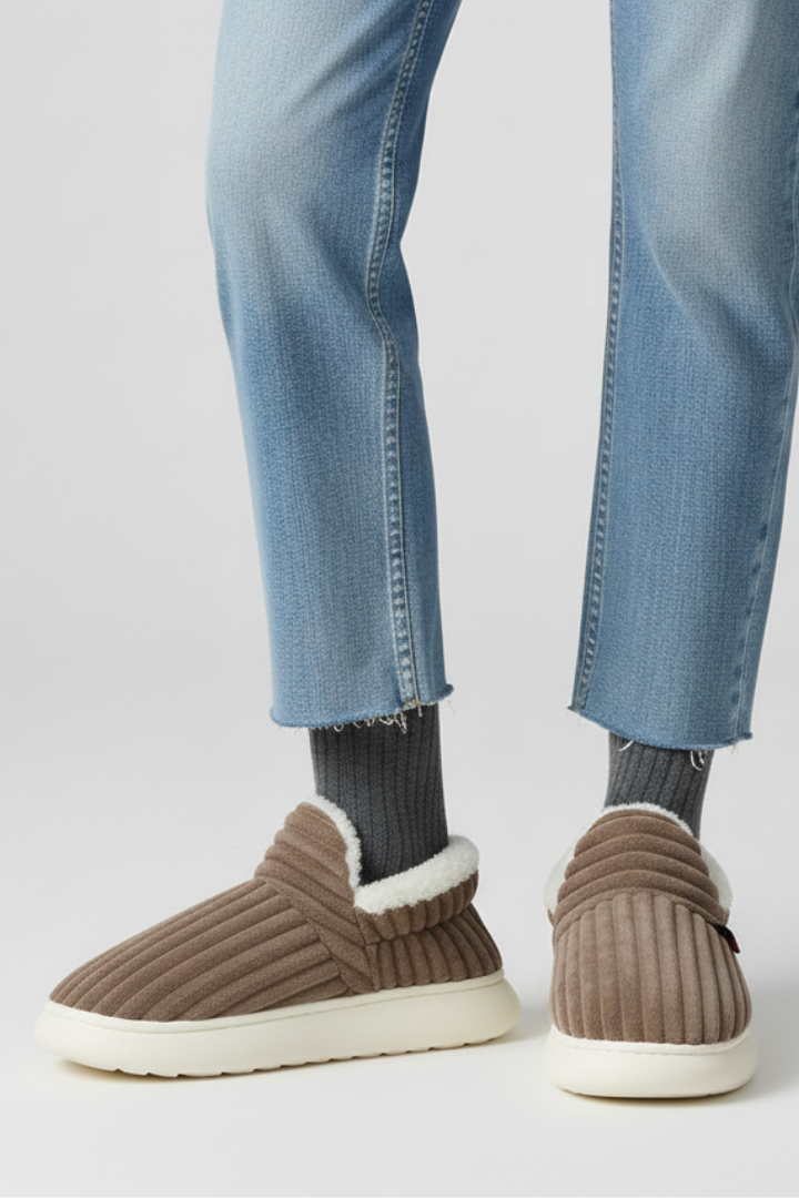 Slippers with ribbed upper and soft inner lining, product still life