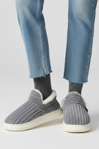 Slippers with ribbed upper and soft inner lining, product still life