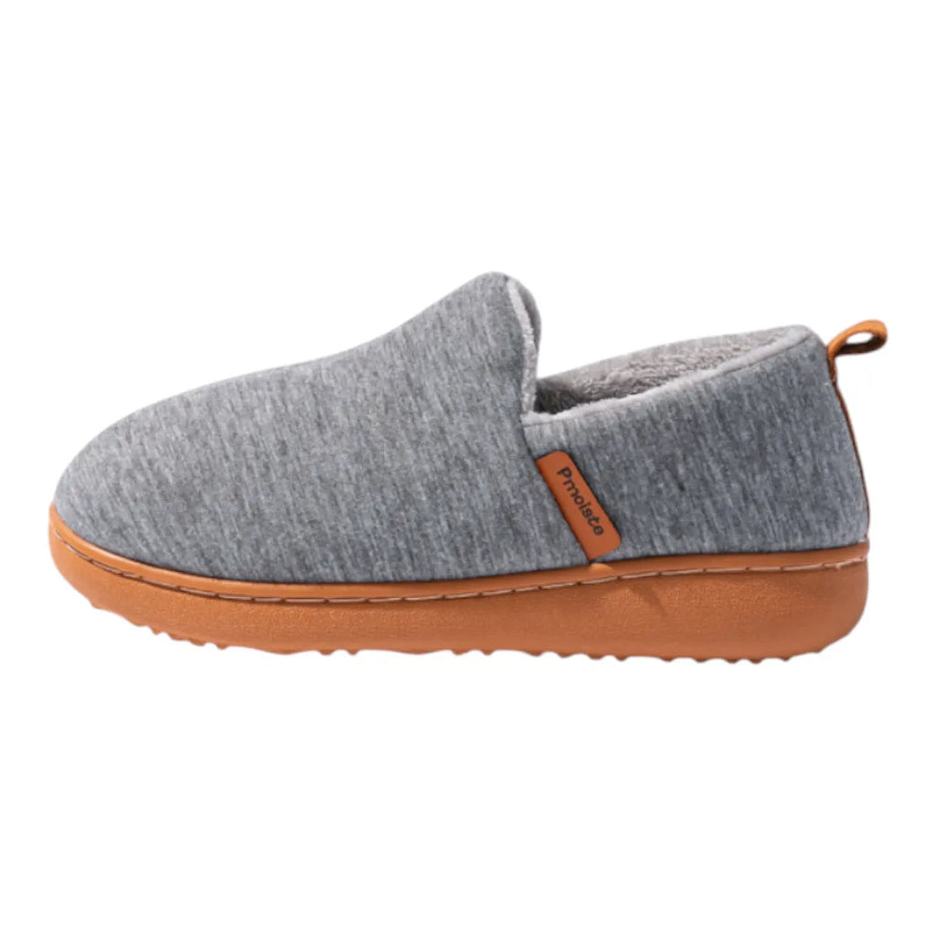 Fleece-lined slippers with cushioned footbed and hard outsole, product still life