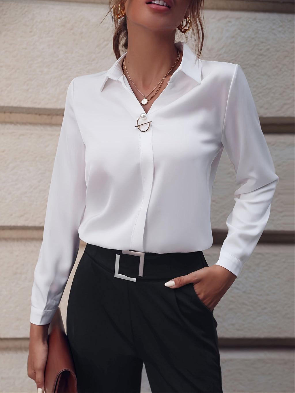 Women's white long sleeve blouse in a slim, tailored office fit