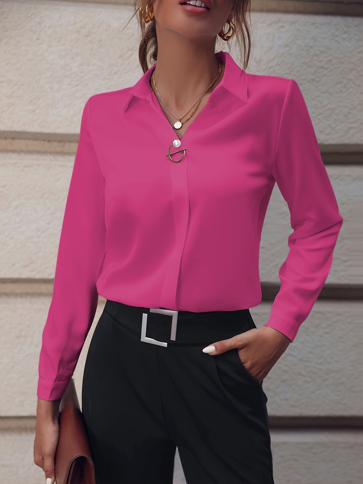 Women's black long sleeve blouse in a slim, tailored office fit