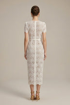 Women's white lace midi dress with a V-neck and button-through front