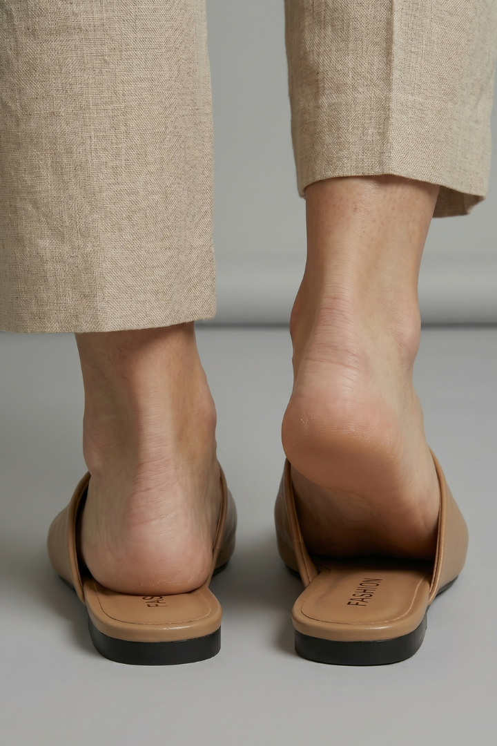 Leather sandals with square toe, product still life
