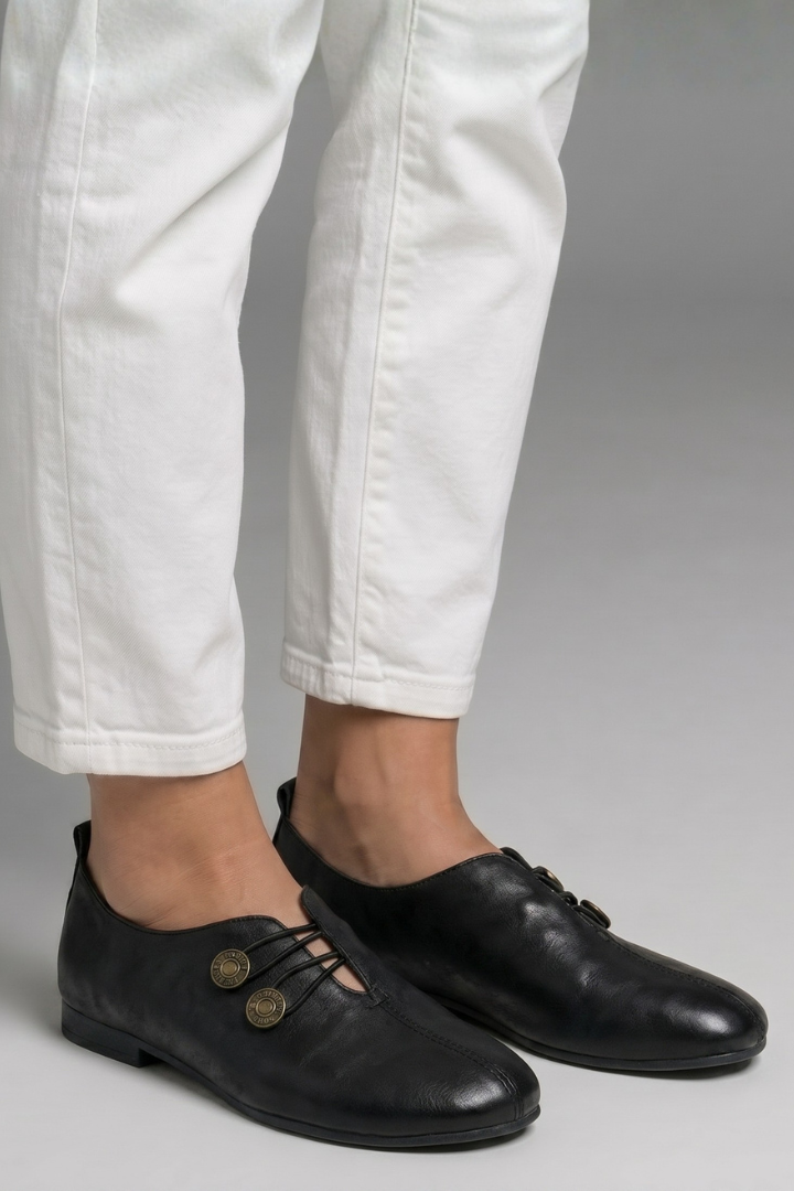 Leather slip-on loafers, product still life