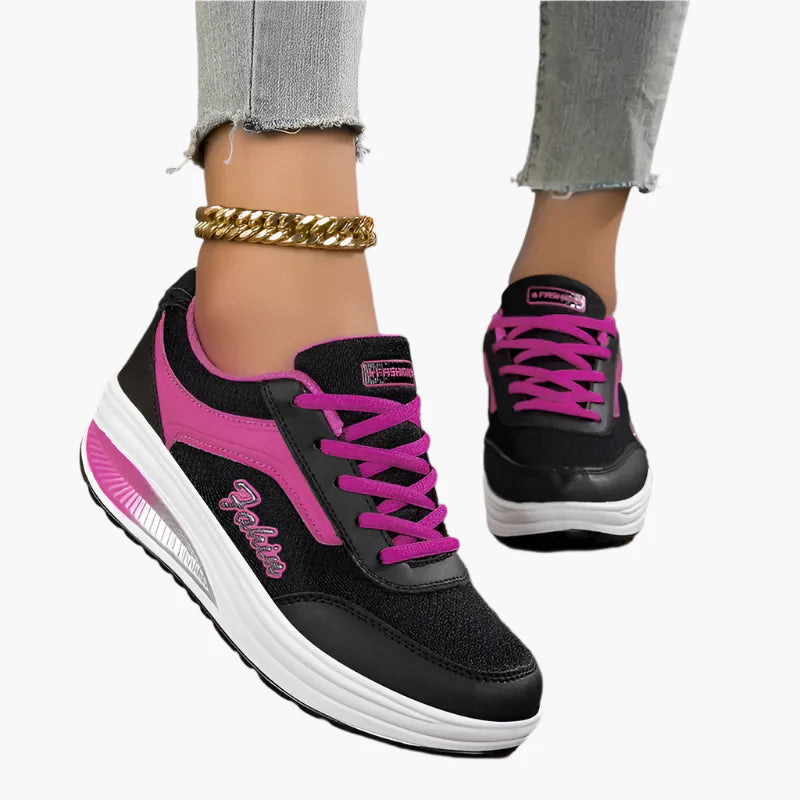 Women's black air cushion trainers with a lightweight flexible sole
