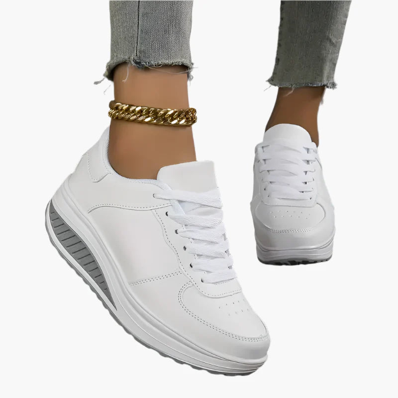 Women's black air cushion trainers with a lightweight flexible sole