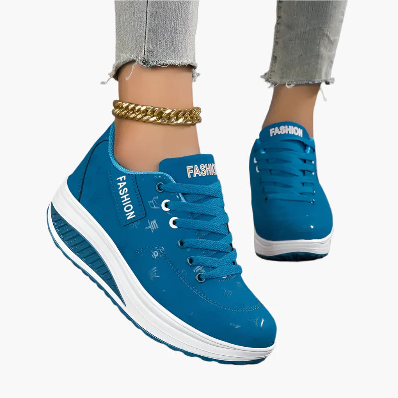 Women's black air cushion trainers with a lightweight flexible sole