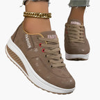Women's black air cushion trainers with a lightweight flexible sole