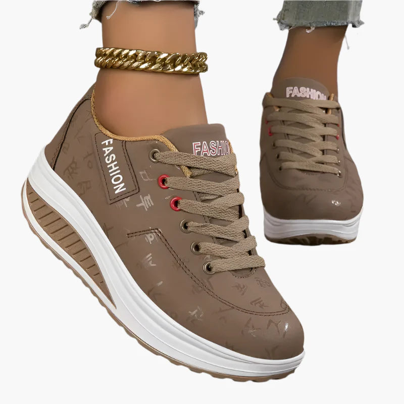 Women's black air cushion trainers with a lightweight flexible sole
