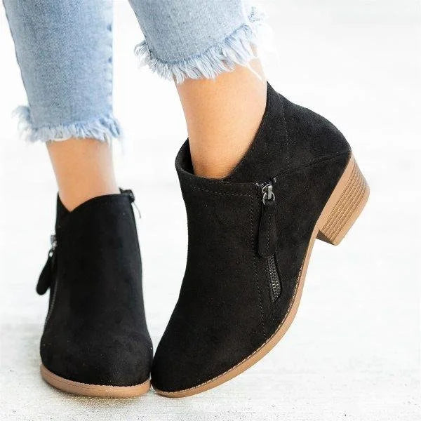 Women's blue vintage-style ankle boots with a cushioned stable heel