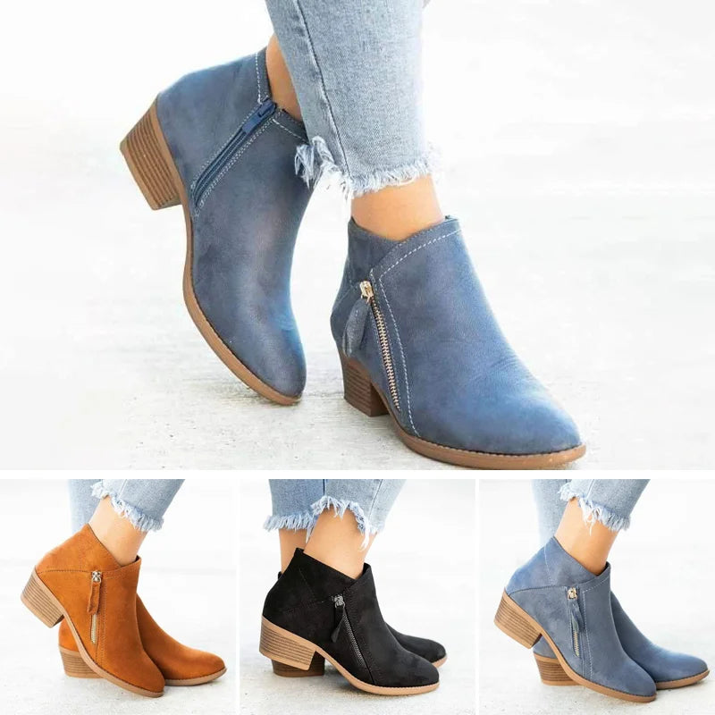 Women's blue vintage-style ankle boots with a cushioned stable heel