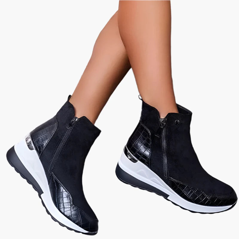 Women's beige wedge ankle boots with a side zip fastening