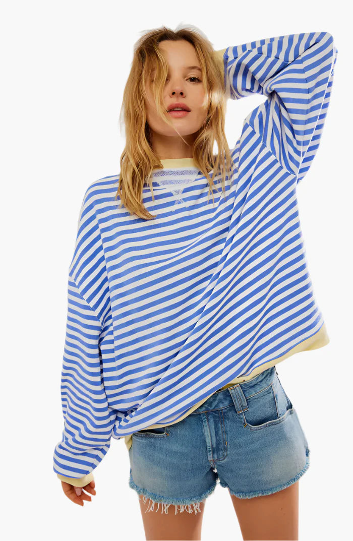 Sky blue striped oversized knit jumper with an oversized, relaxed fit