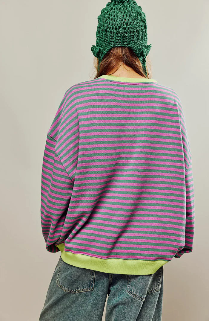 Pink and green striped oversized knit jumper with an oversized, relaxed fit