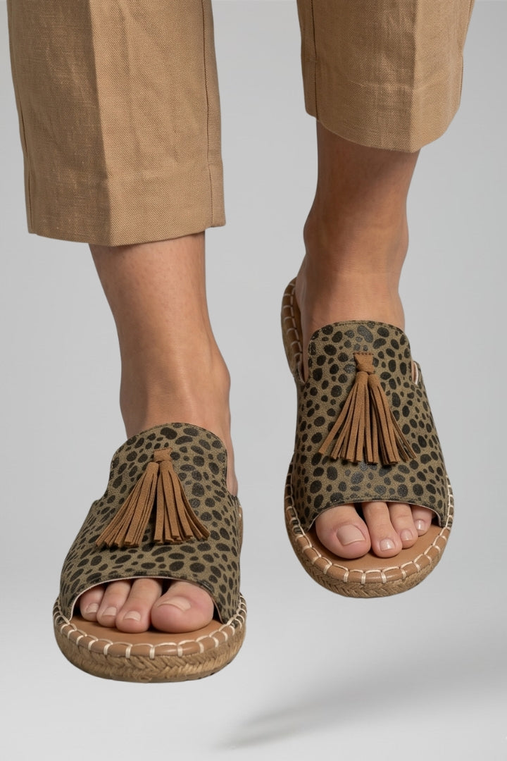 Slip-on comfort sandals with cushioned footbed, product still life