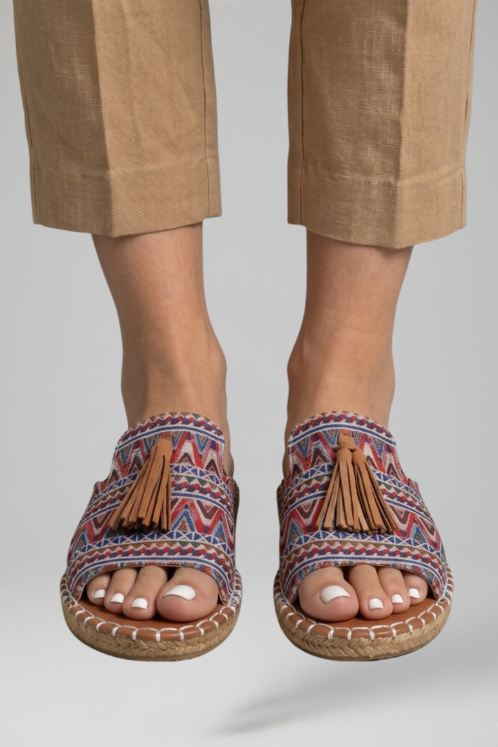 Slip-on comfort sandals with cushioned footbed, product still life
