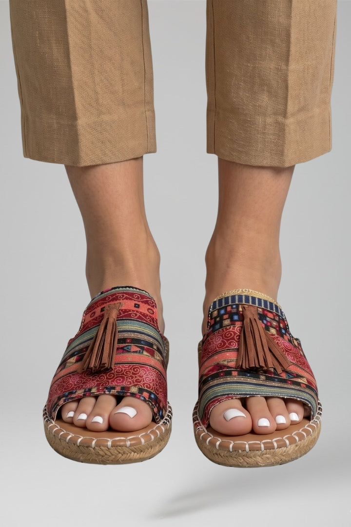 Slip-on comfort sandals with cushioned footbed, product still life