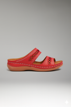 Dual-strap slide sandals with decorative cutouts, product still life