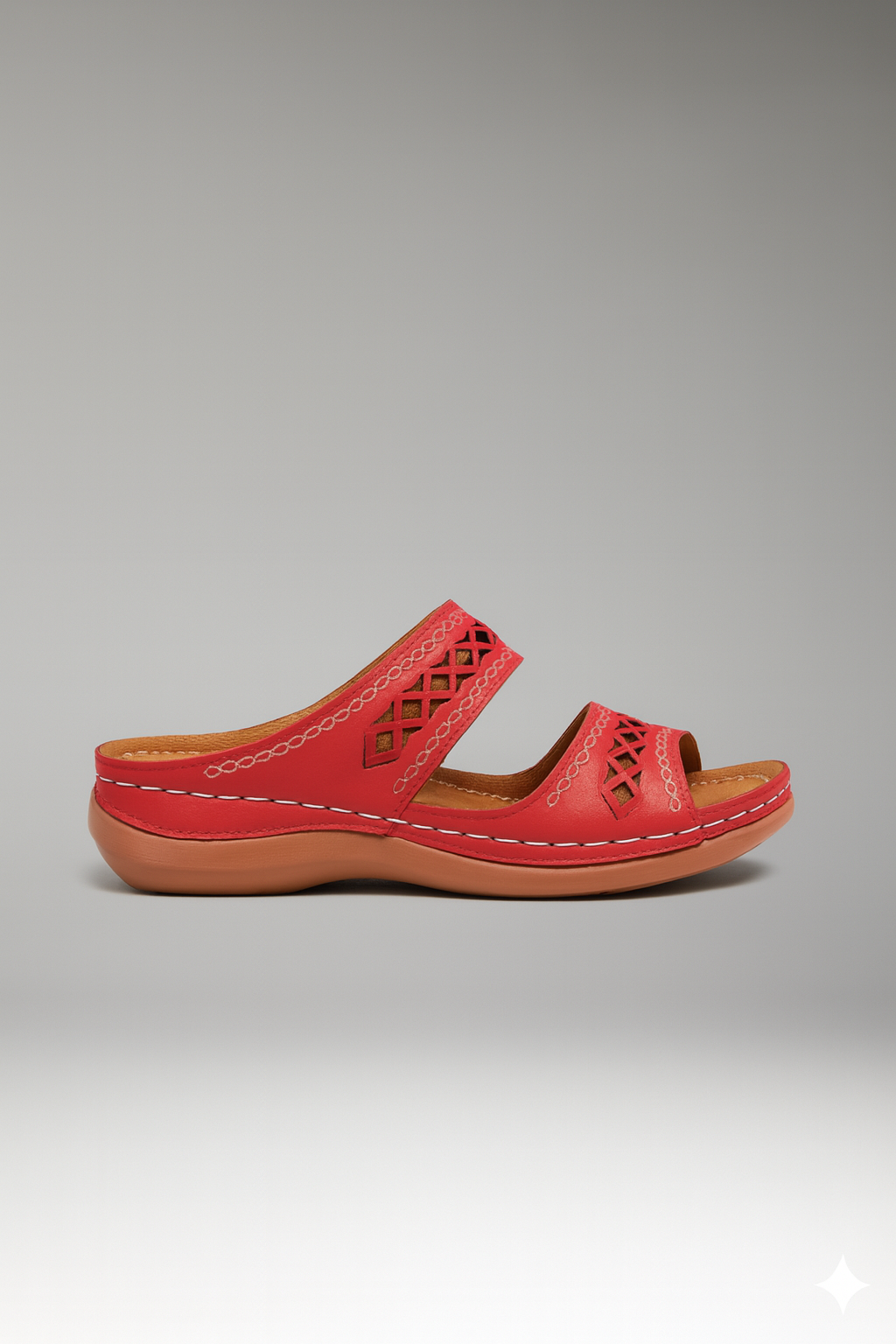 Dual-strap slide sandals with decorative cutouts, product still life