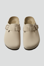 Beige slippers with wide straps and moulded footbed