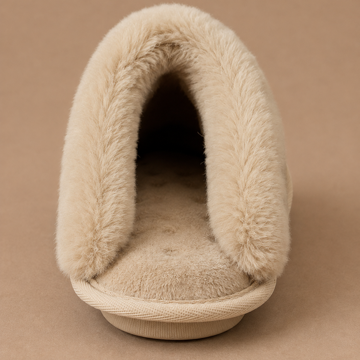 Close-up of faux fur lining on suede mule slippers