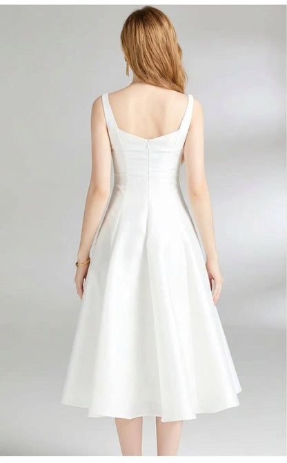 Women's white square neck midi dress with a sleeveless A-line skirt