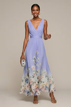 Women's dark blue floral print maxi dress with a ruched bodice and V-neck