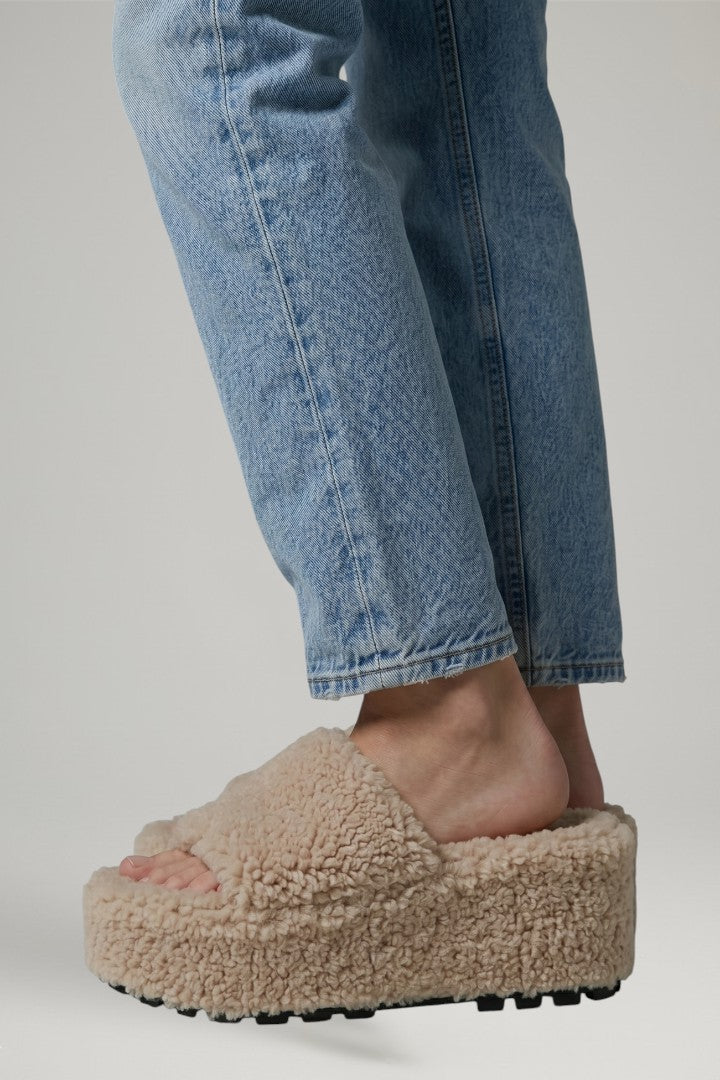 Close-up of strap detail on wedge sandals