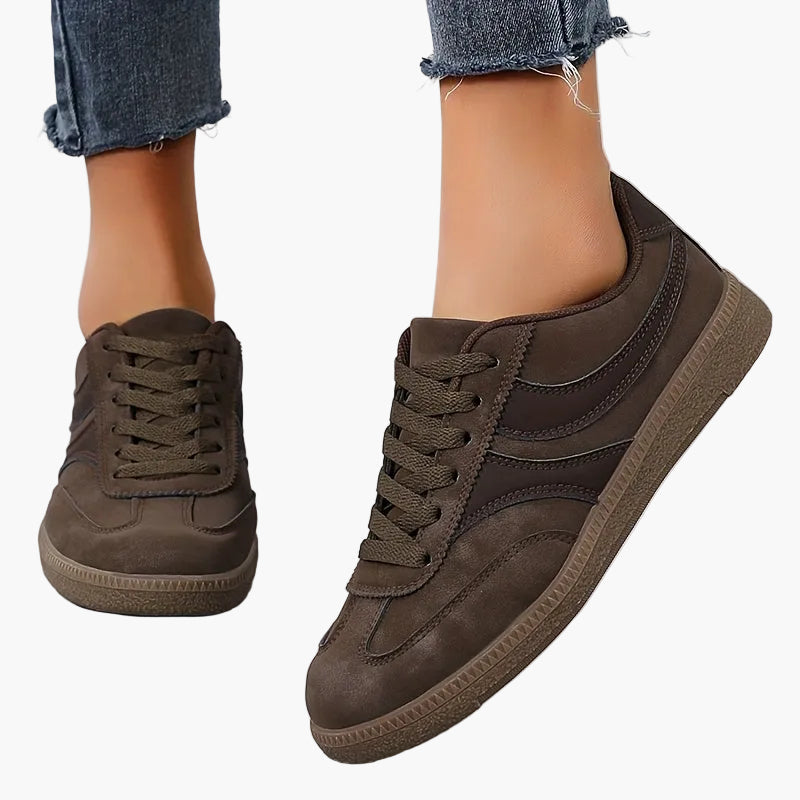 Women's brown retro low top trainers with a vintage-inspired finish