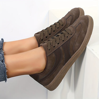 Women's brown retro low top trainers with a vintage-inspired finish