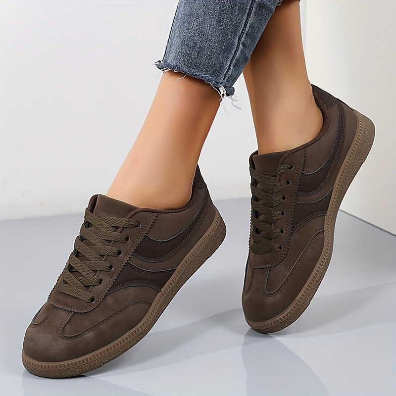 Women's brown retro low top trainers with a vintage-inspired finish