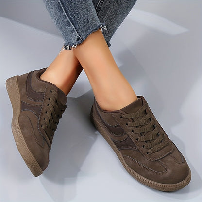 Women's brown retro low top trainers with a vintage-inspired finish