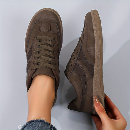 Women's brown retro low top trainers with a vintage-inspired finish