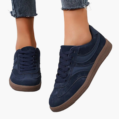 Women's brown retro low top trainers with a vintage-inspired finish