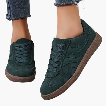 Women's brown retro low top trainers with a vintage-inspired finish