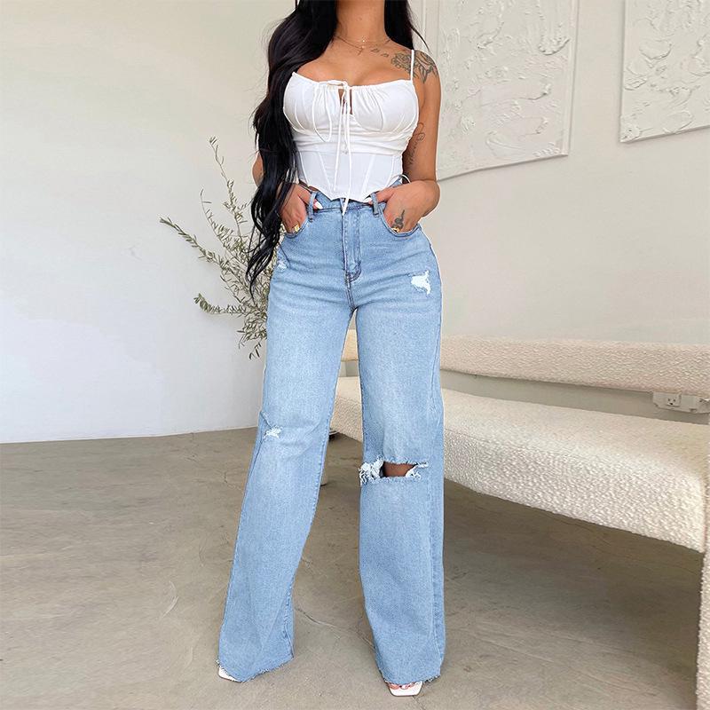 Women's light blue high waisted ripped wide leg jeans with knee cuts
