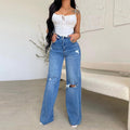 Women's blue high waisted ripped wide leg jeans with knee cuts