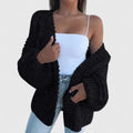 Women's black chunky knit open front cardigan for autumn layering